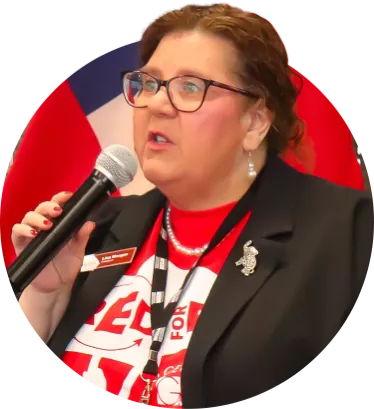 Lisa Morgan speaks into a microphone